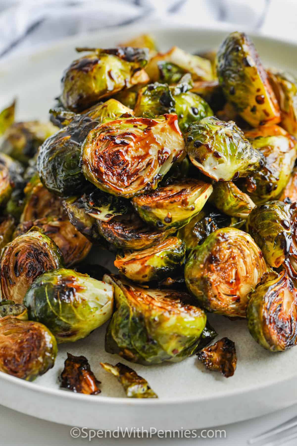 Crispy Roasted Balsamic Brussels Sprouts on a white plate