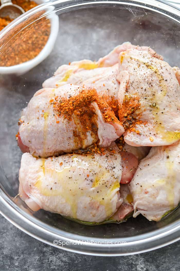 Baked Chicken Thighs before seasoning & baking