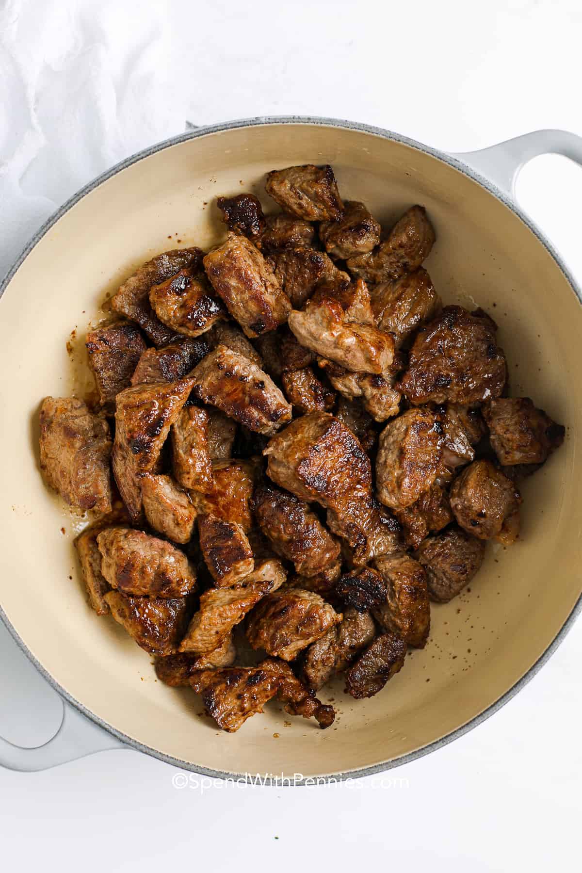 chuck cubes for Beef Bourguignon being browned in a pan