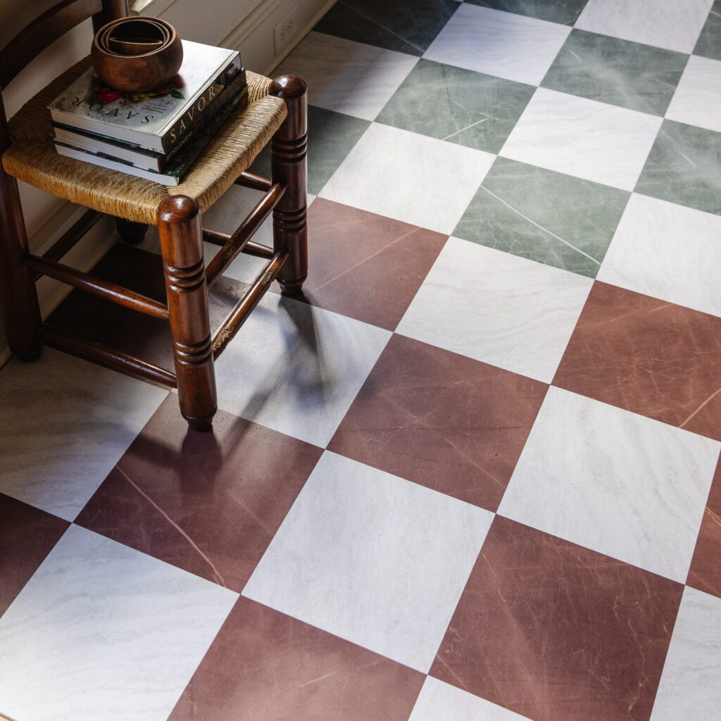 FloorPops peel-and-stick floor tiles in red & white marble and green & white marble checkerboard