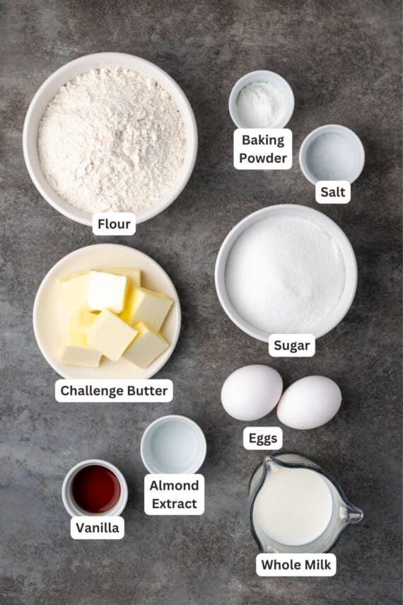 Almond cupcakes ingredients with text labels overlaying each ingredient.