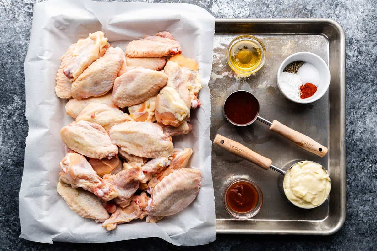 An overhead view of the ingredients needed to make bang bang chicken wings.