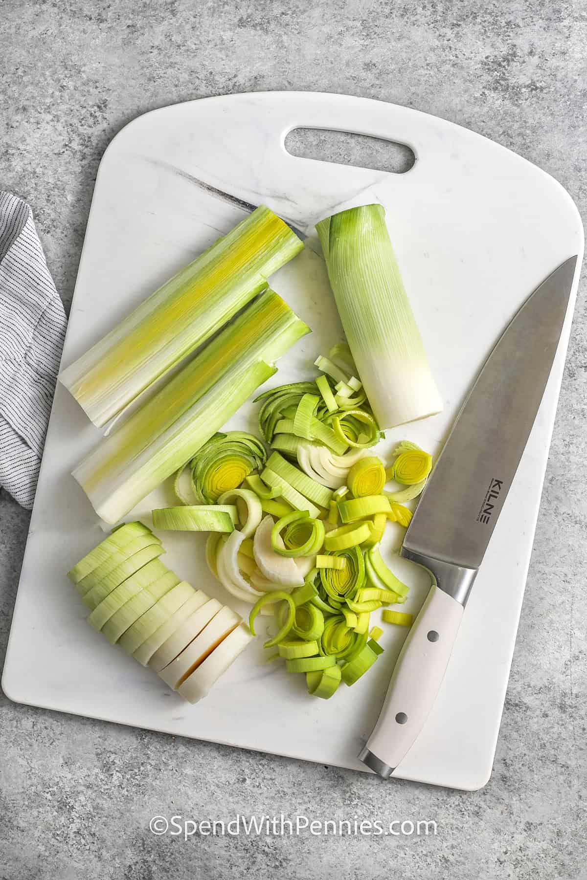 slicing leeks to make Potato Leek Soup