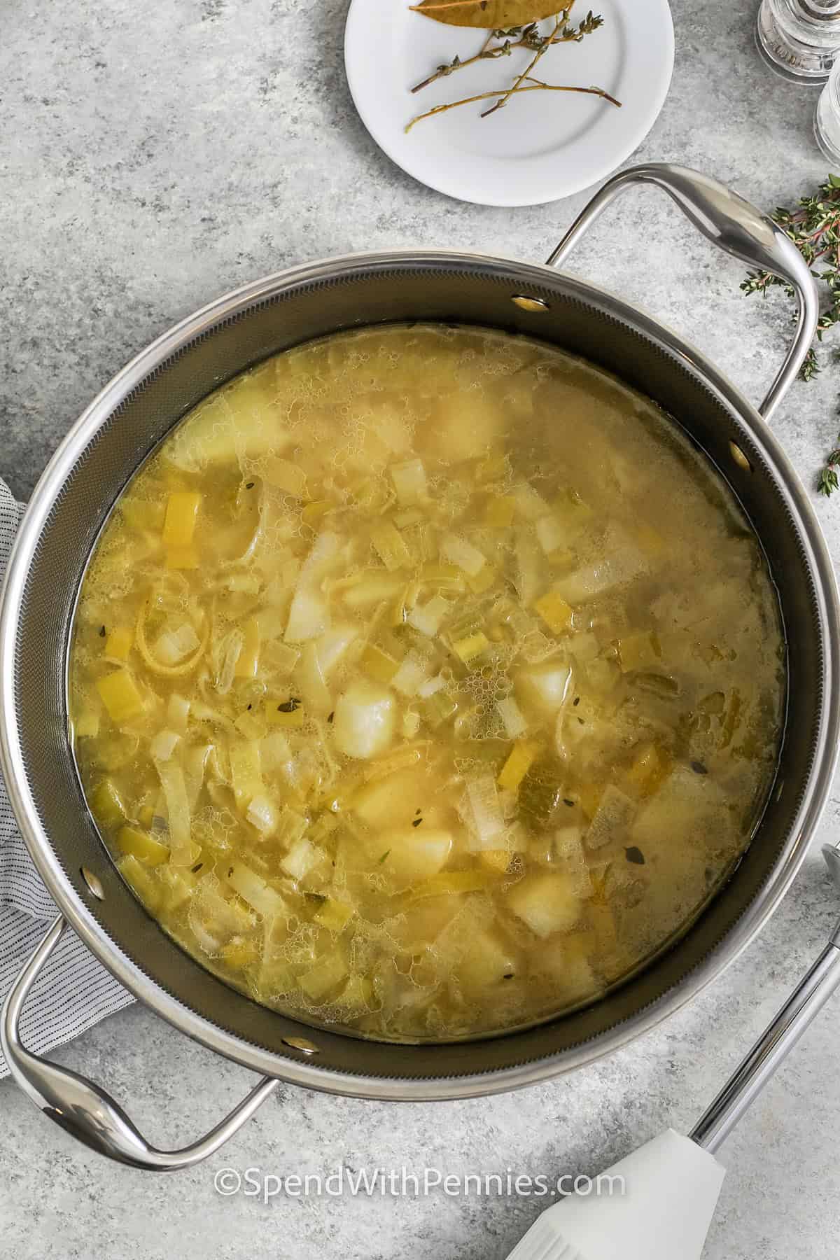 ingredients in a pot to make Potato Leek Soup