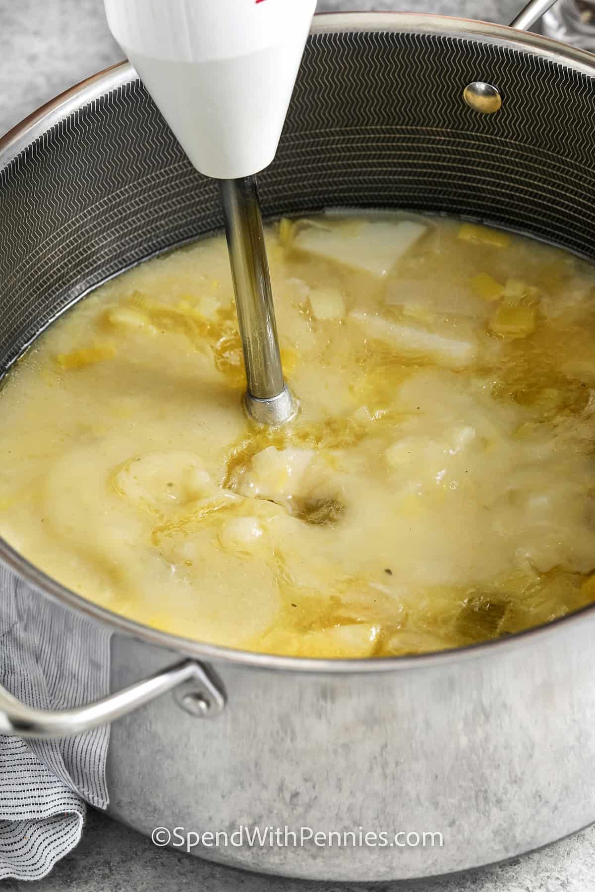 blending ingredients in pot to make Potato Leek Soup