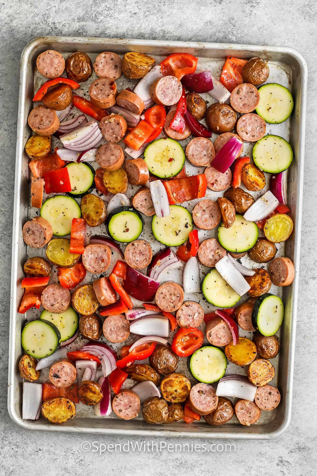 sheet pan of Roasted Sausage and Potatoes before cooking