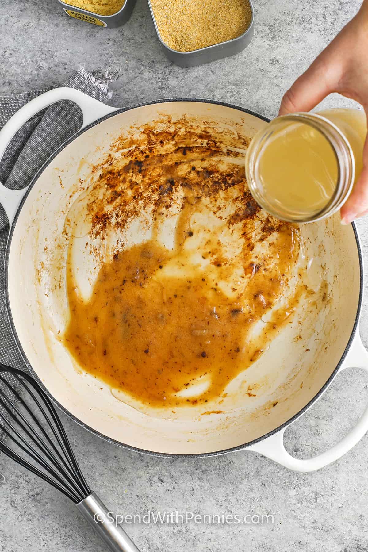 adding chicken stock to butter and flour to make Chicken Stroganoff