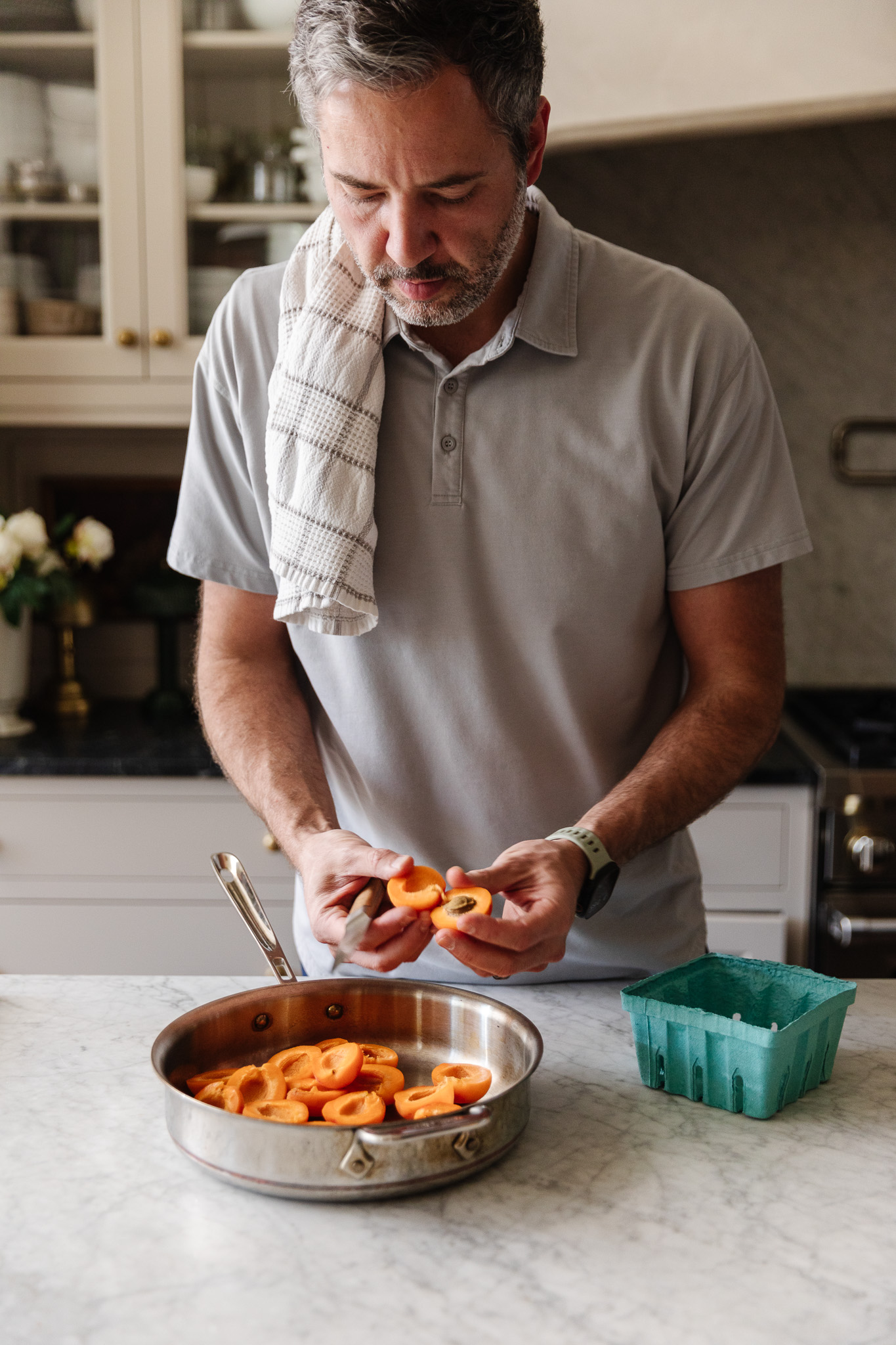 Chris prepping the apricots for the stainless steel pan