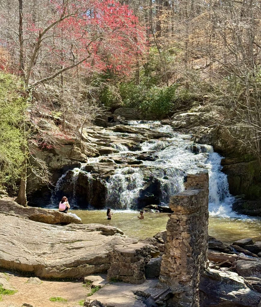 People Playing In Waterfall at Cochran Mills Park Near Serenbe Georgia