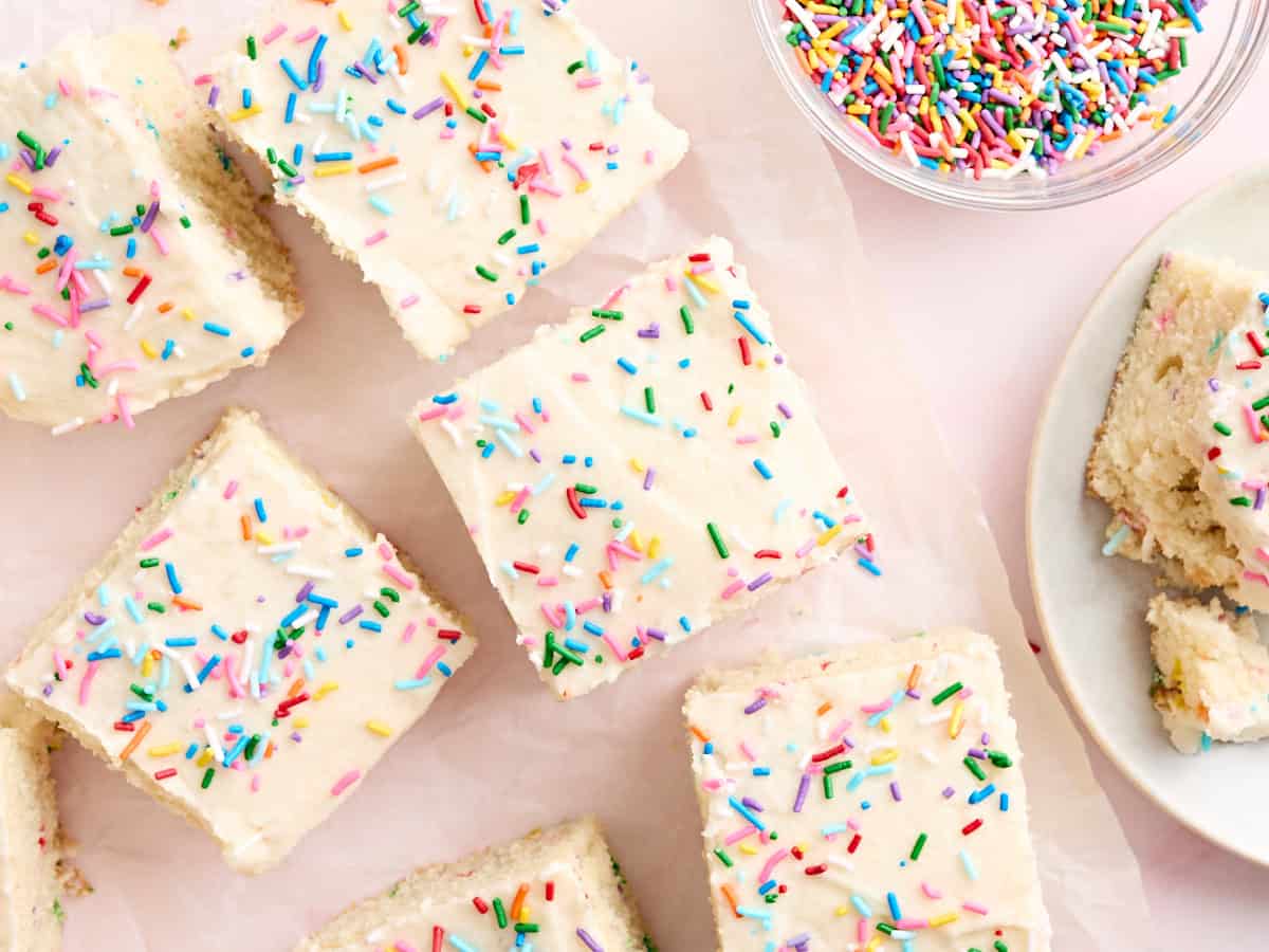 Overhead view of frosted and sliced cookie dough bars.